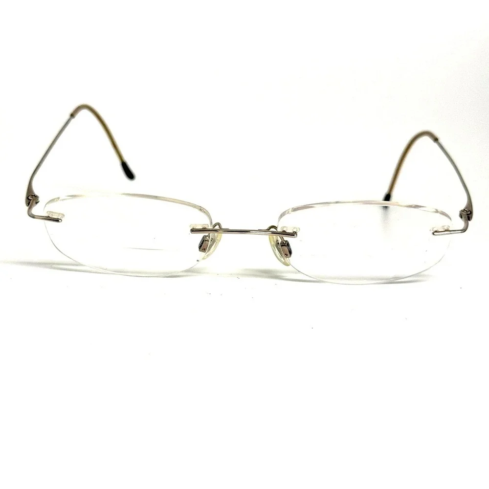 Charmant CH8600 Silver Beta Titanium Rimless Eyeglass Frames 49-19-140mm